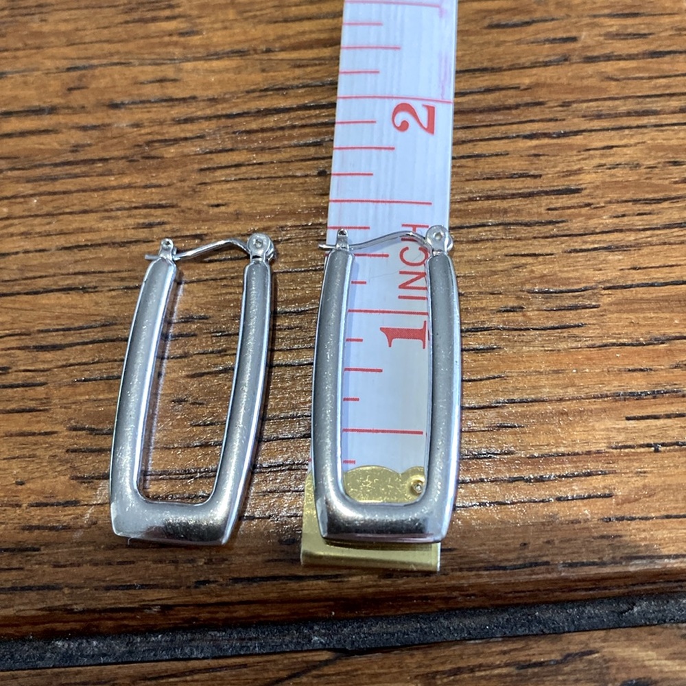 Silver 1.5 in rectangle pierced earrings. Very secure and light. They are pretty - Picture 11 of 12